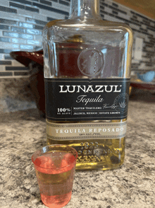 a bottle of lunazul tequila is on a counter