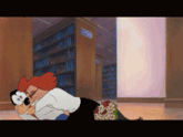 a cartoon of a man and woman kissing in a library with a sign that says library
