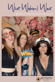 a group of women posing in front of a floral wall with the words what women want on the top