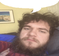 a man with a beard is laying in bed with a speech bubble above his head