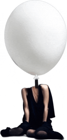 a woman with a balloon in her head