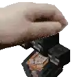 a pixelated image of a person 's hand holding something