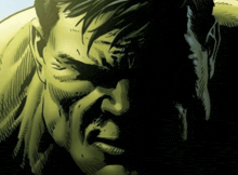 a close up of a man 's face with a shadow on his face