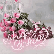 a bouquet of pink roses with the words `` happy birthday '' written on them