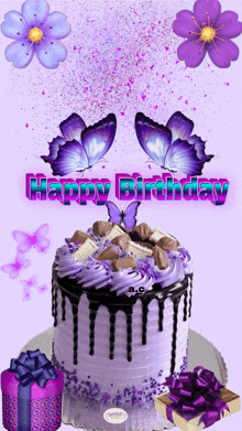 a birthday cake with purple frosting and butterflies and the words happy birthday