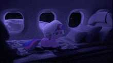 twilight sparkle sits on a bed looking out the window