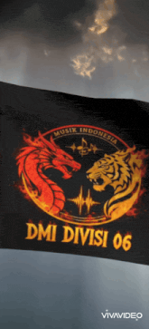a black flag with a dragon and a tiger and the words dmi divisi 06