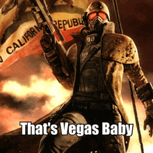 a poster of a man holding a gun with the words that 's vegas baby