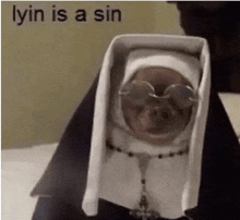 a dog dressed as a nun with glasses and a rosary