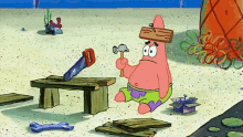 patrick star from spongebob is holding a hammer and a saw