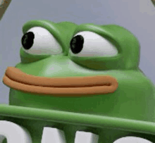 a close up of a green frog with a brown mouth holding a sign .