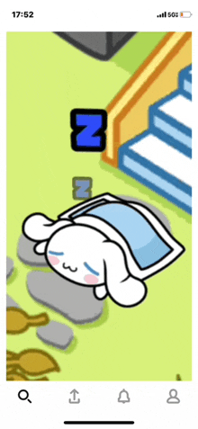 a phone screen shows a cartoon character sleeping in a bed with the number 8 next to him