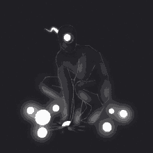 a drawing of a person kneeling down with circles surrounding them