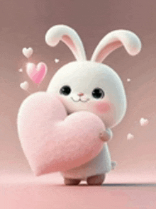 a cute bunny rabbit is holding a pink heart in its paws .