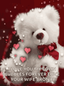 a teddy bear is holding a heart with hearts coming out of it .