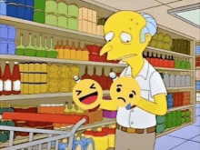 mr. homer simpson is holding a smiley face in a supermarket .