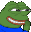 a pixel art drawing of a green frog wearing a blue shirt .