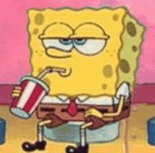 spongebob squarepants is sitting on a toilet drinking a drink through a straw .