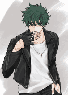 a man with green hair is smoking a cigarette and wearing a leather jacket