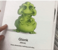 a person is holding a book with a picture of a green monster and the word glonk on it