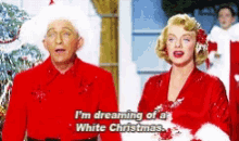 a man and a woman are singing i 'm dreaming of a white christmas ..