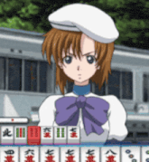 a girl in a white hat is playing mahjong with chinese characters on the cards