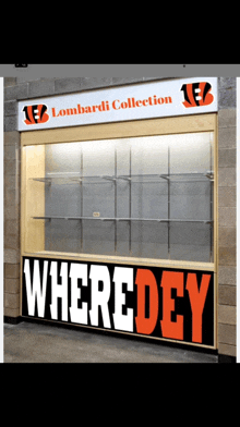 a lombardi collection display case with shelves and a sign that says wheredey