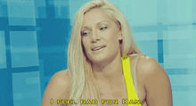 a woman says " i feel bad for dan " while wearing a yellow tank top
