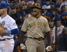 a baseball player in a san diego uniform yells