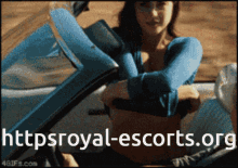 a woman is sitting in a car with the website httpsroyal-escorts.org written below her