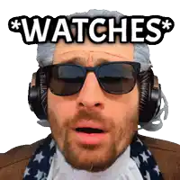 a man wearing sunglasses and headphones has the word watches on his face