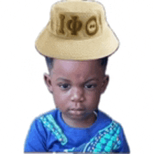 a young boy wearing a hat with the letters ipf on it