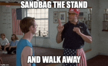 a man in an american flag skirt is talking to another man in a gym with the caption sandbag the stand and walk away