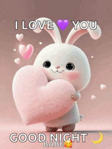 a picture of a bunny holding a heart that says " i love you "