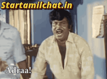 a man is laughing with the words starttamilchat.in written above him
