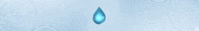 a drop of water is floating in the air on a blue background