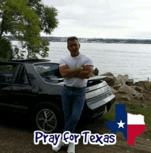 a man standing in front of a car with the words pray for texas written on the bottom