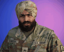 a man in a u.s. army uniform has dhinsa written on his uniform