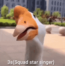 a close up of a goose with its mouth open and the words 3s ( squad star singer ) written below it .