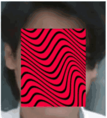 a close up of a person 's face with a red and black optical illusion