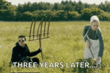 a man is holding a pitchfork in a field with the words three years later