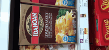 several boxes of idahoan loaded baked casserole are on a shelf