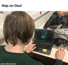 a picture of a person using a laptop with the words hop on osu below it