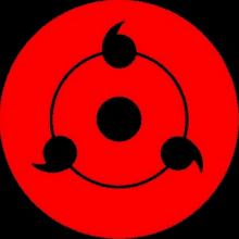 a close up of a red circle with three black circles in the middle .