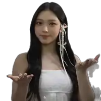a woman with long black hair wearing a white dress with pearls in her hair