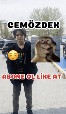 a boy is standing in a parking lot with a picture of a cat behind him and the words cemozdek above him