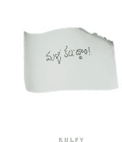 a piece of paper with a message in a foreign language written on it