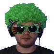 a man wearing a green wig and sunglasses is looking at the camera .