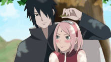 sasuke and sakura are sitting next to each other under a tree .