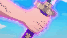 a person is holding a sword with a purple handle with a flower on it